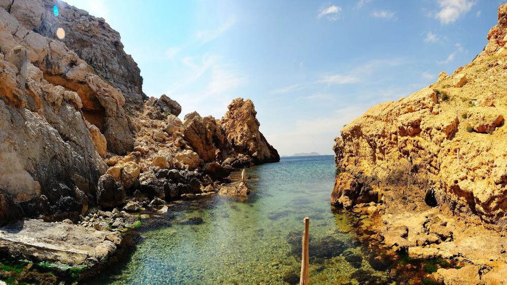 Serene Coastal Escape in Nature's Embrace wallpaper