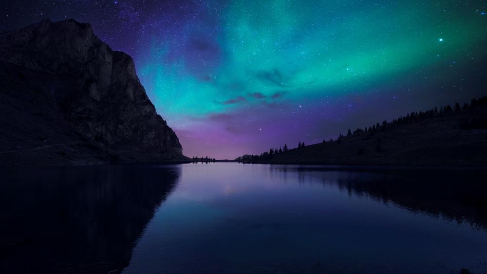 Mystical Aurora Borealis Over Tranquil Lake wallpaper