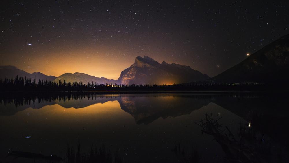 Mountain Reflections Under Starry Night Sky wallpaper