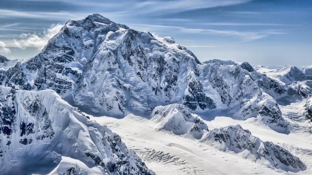 Snow-Capped Majesty in the Mountain Heights wallpaper