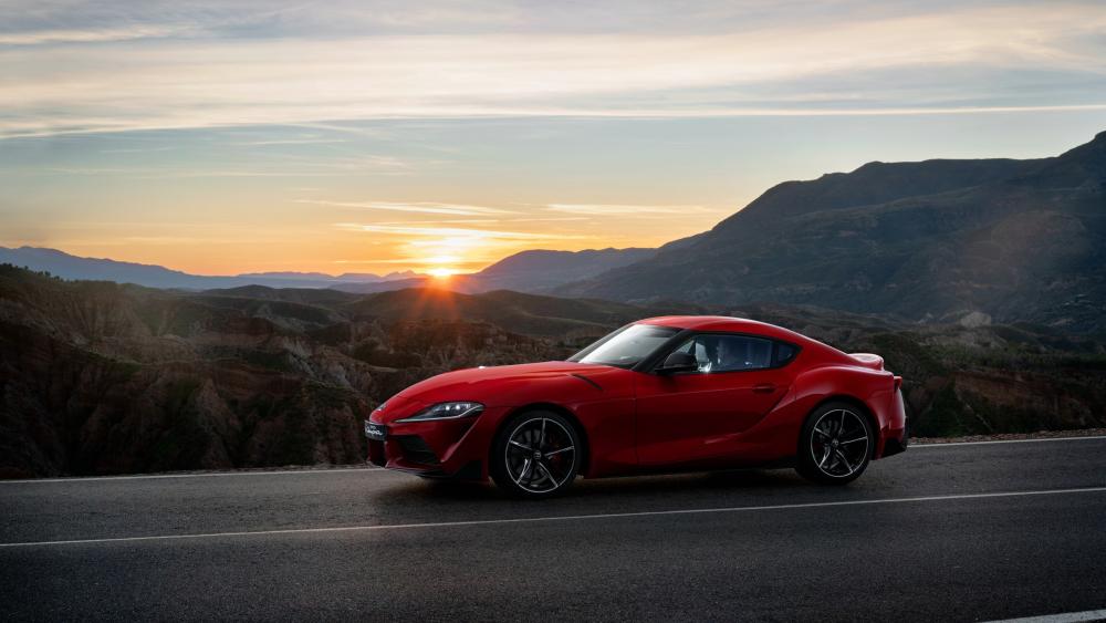 Sunset Drive with a Red Toyota Supra wallpaper