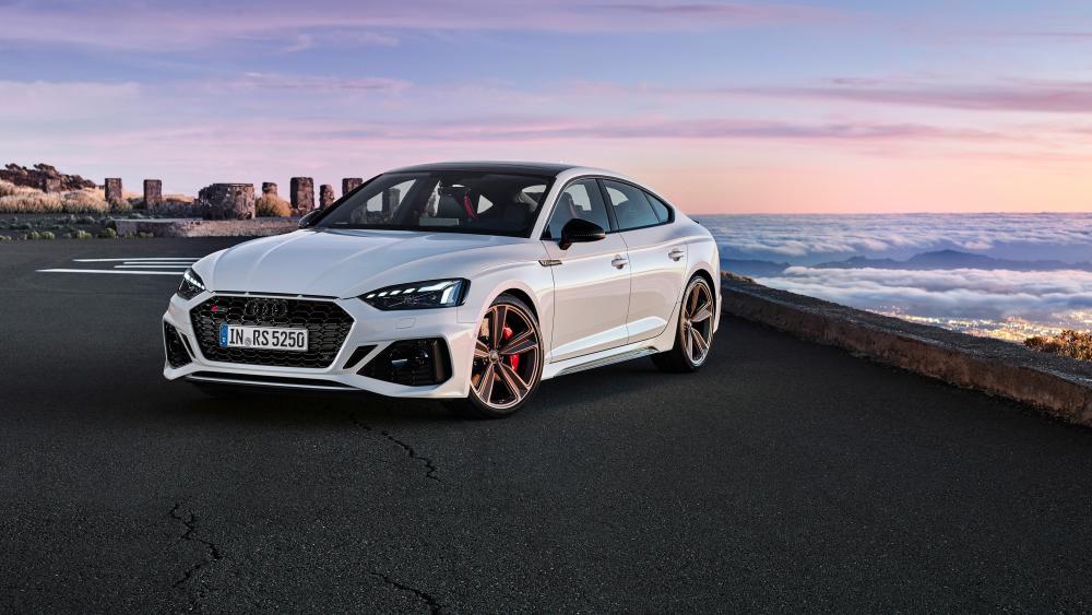 Sleek Audi RS5 Captured in Scenic Landscape wallpaper