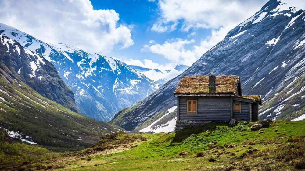 Tiny turf house in Geirangerfjord wallpaper