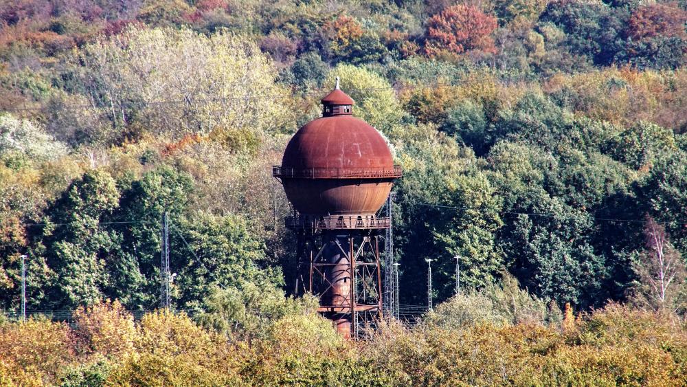 Water tower in the forest wallpaper