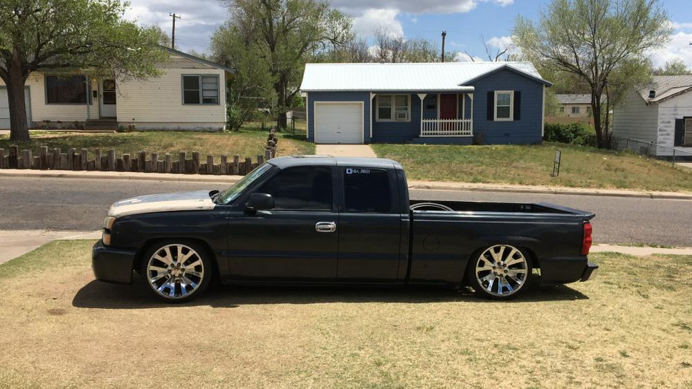 Sleek Custom Pickup on a Sunny Day wallpaper