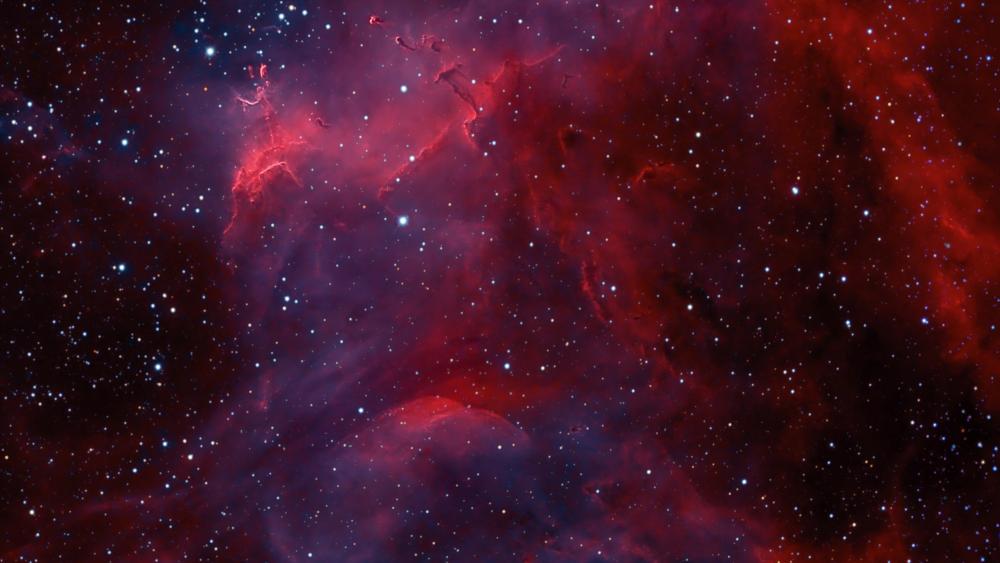 Cosmic Glory in Red Nebula wallpaper