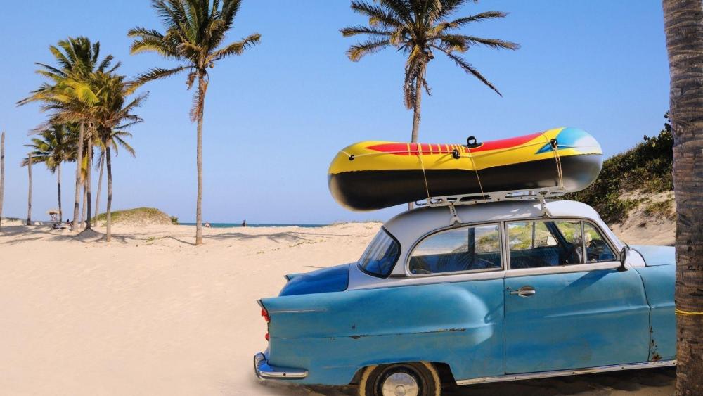 Vintage car on the beach wallpaper