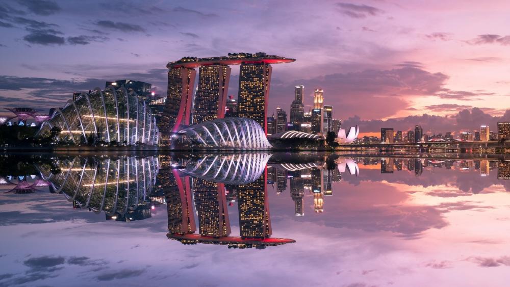 Singapore reflected in the water at sunset wallpaper