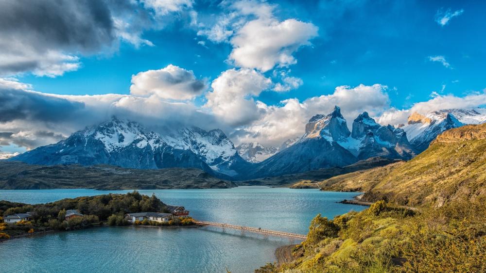 Majestic Mountains Reflected in Tranquil Waters wallpaper