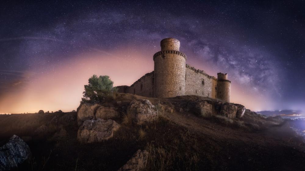 Ancient fortress under the milky way wallpaper