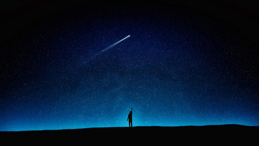 Comet on the starry night sky wallpaper