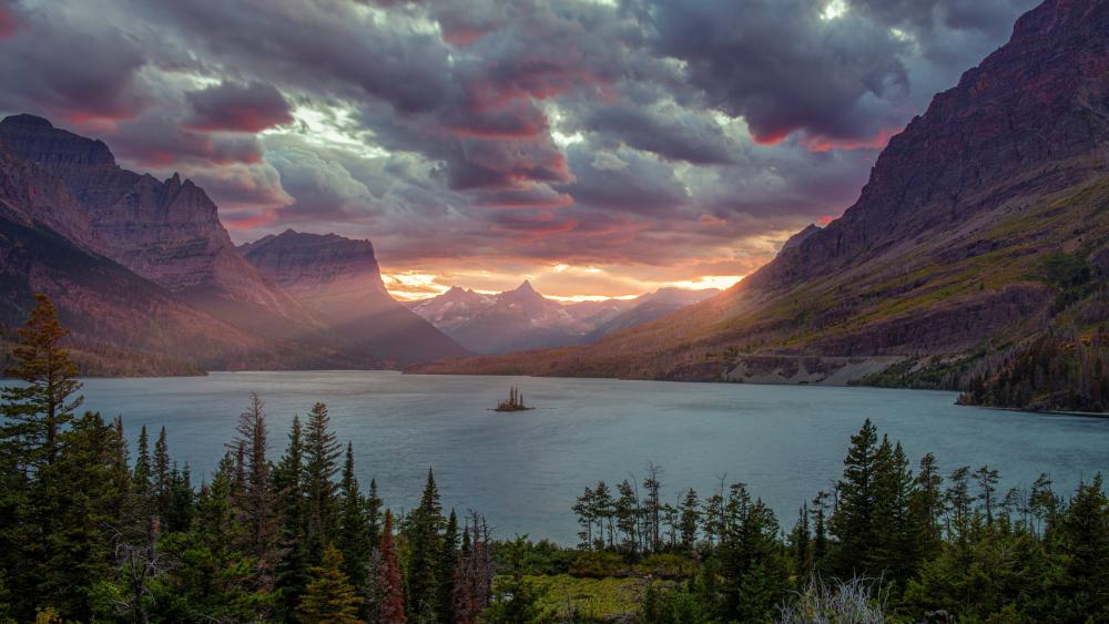 Sunset in cloudy landscape at Saint Mary Lake wallpaper