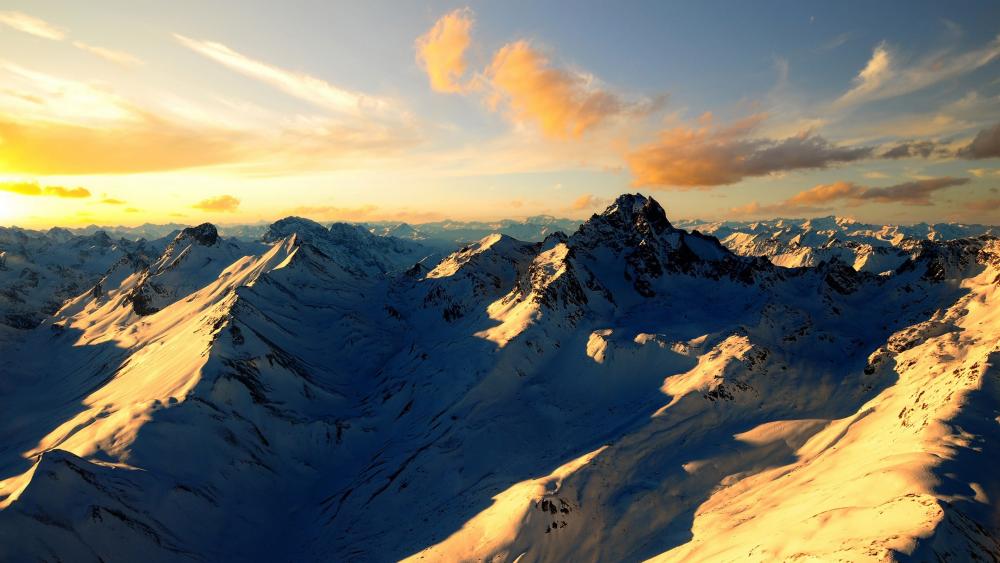 Majestic Snow-Capped Mountains at Dusk wallpaper