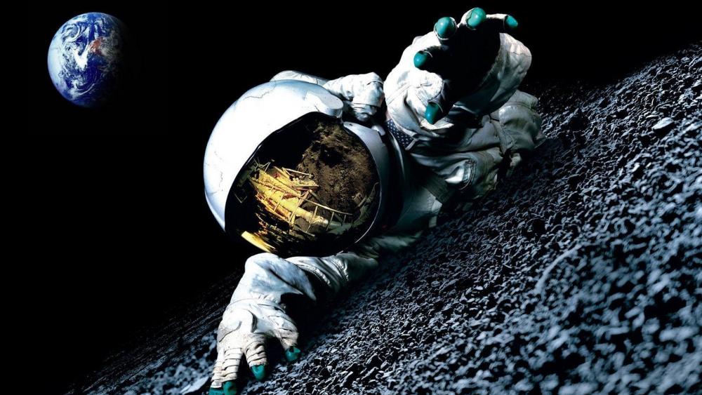 Astronaut on Lunar Surface with Earth in Distance wallpaper