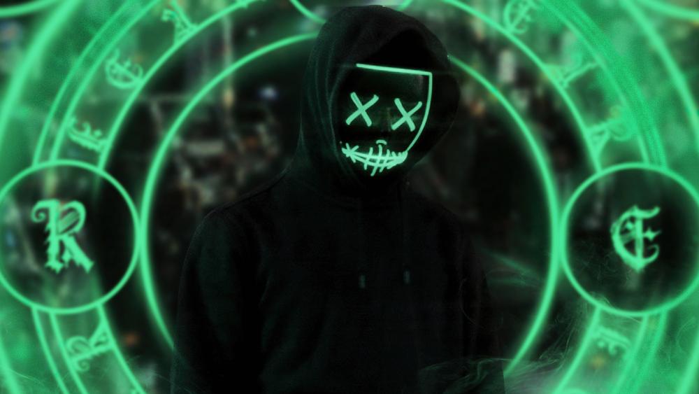 Mystic Neon Masked Figure in Green wallpaper