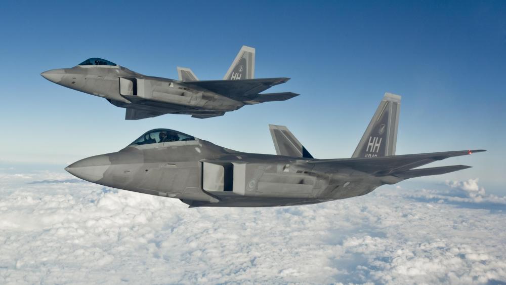 2 F-22 Raptors In The Air wallpaper