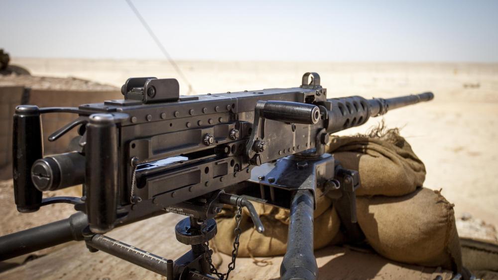 Powerful M2 Browning Machine Gun Ready for Action wallpaper