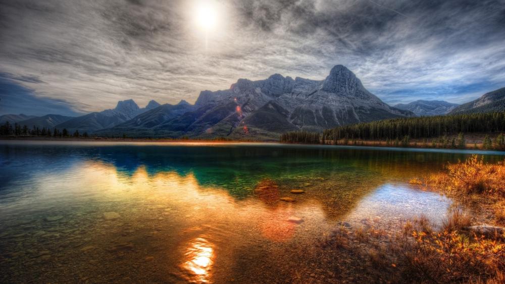 Serene Mountain Reflections in Crystal Clear Water wallpaper