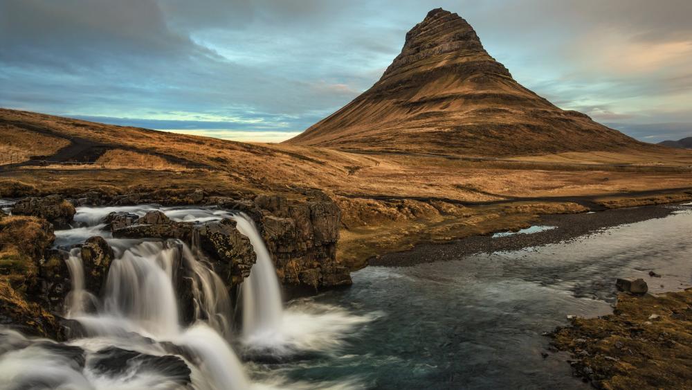 Majestic Mountain and Serene Waterfall Scene wallpaper