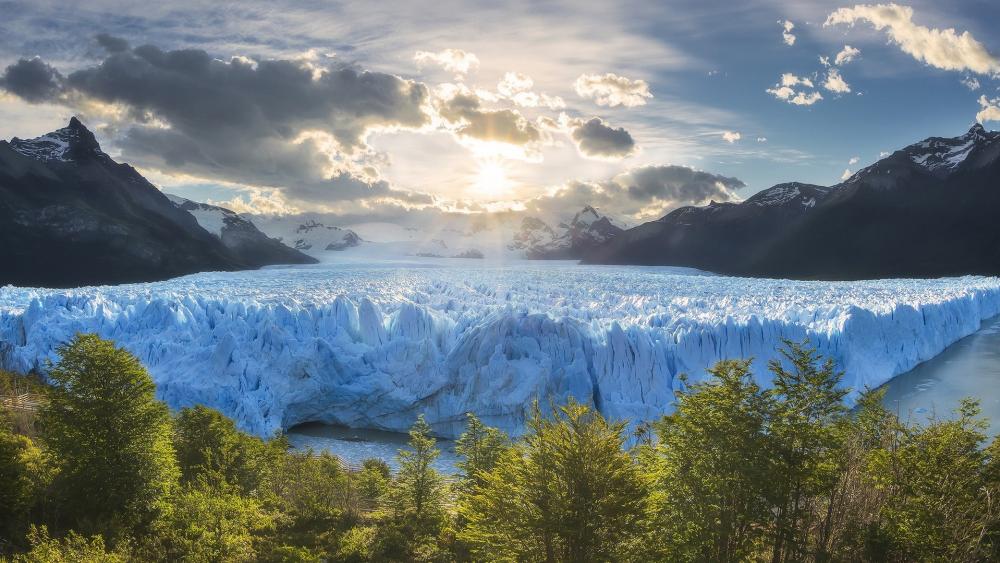 Majestic Glacier in Stunning Sunrise Glow wallpaper