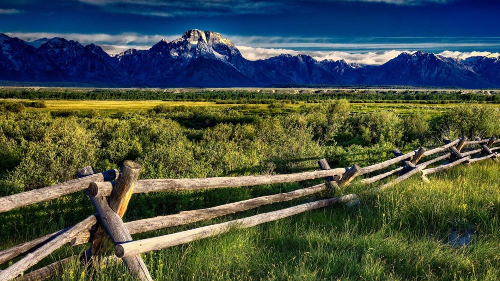 Majestic Mountain Landscape Under a Clear Sky wallpaper