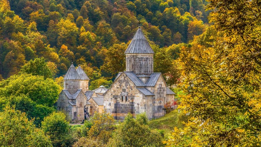 Serene Autumn Landscape with Ancient Architecture wallpaper