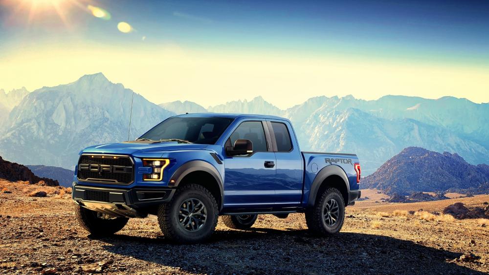 Bold Blue Raptor in Majestic Landscape wallpaper