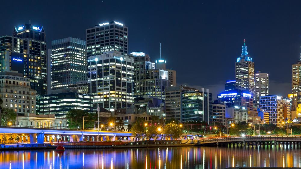Vibrant Cityscape Reflection at Night wallpaper