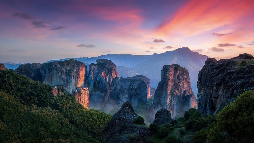 Majestic Sunset Over Meteora Cliffs wallpaper