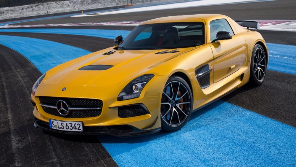 Sleek Yellow Mercedes SLS on the Track wallpaper