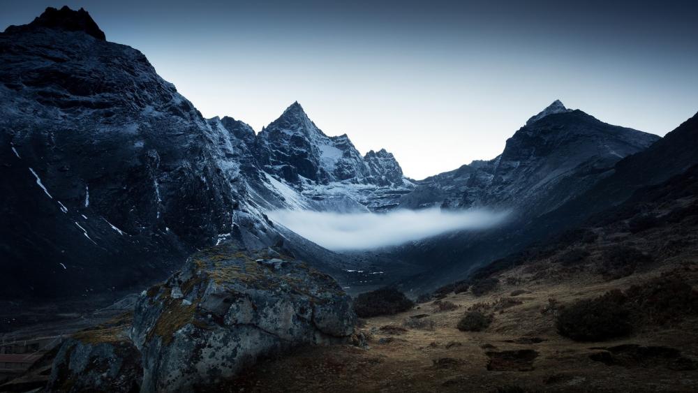 Majestic Snow-Capped Mountains at Dawn wallpaper