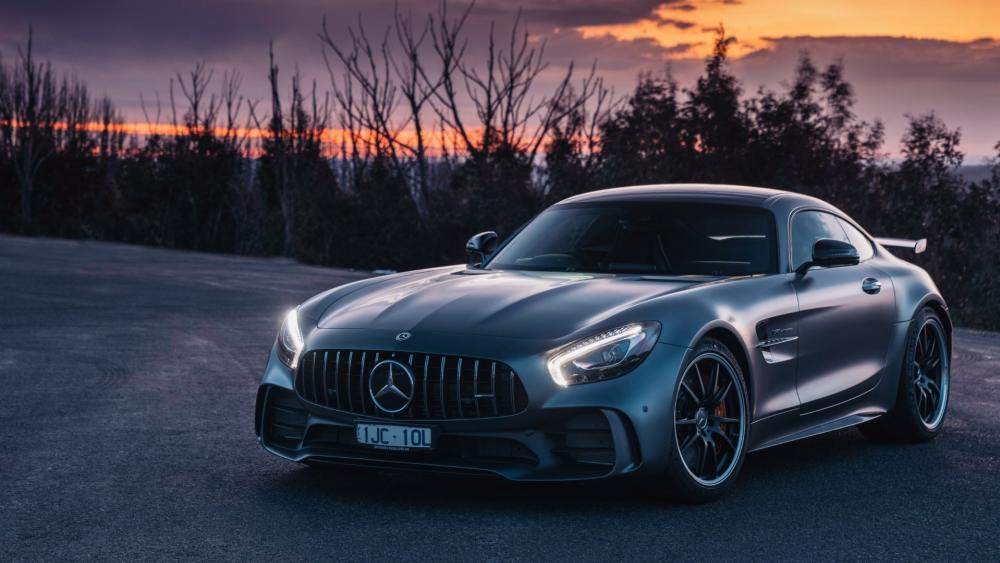 Sleek Mercedes-Benz AMG Against Sunset Sky wallpaper
