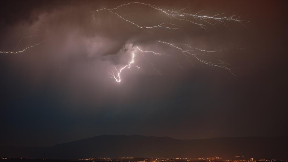 Electric Storm Over the Cityscape wallpaper