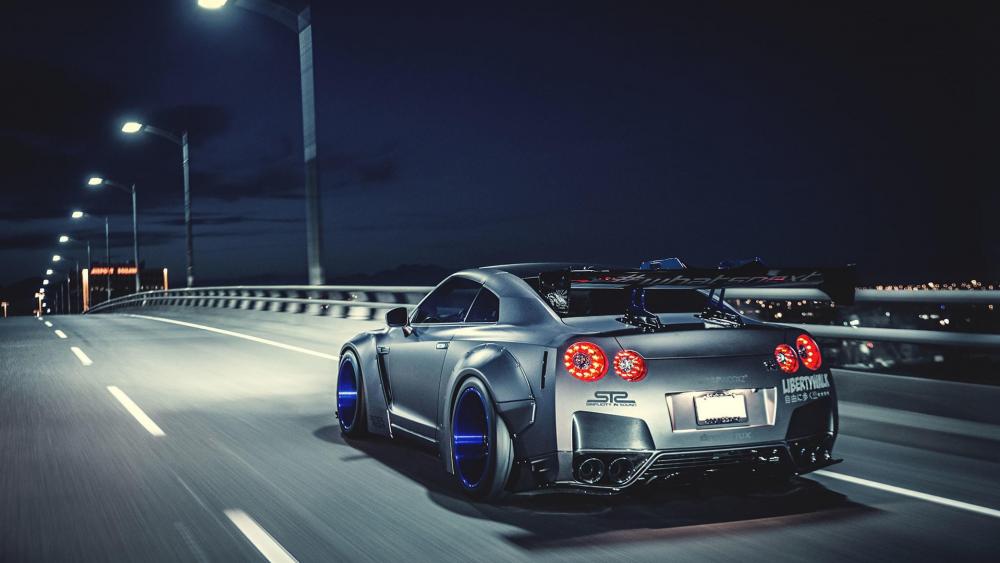 Nissan GT-R Dominates the Night Highway wallpaper