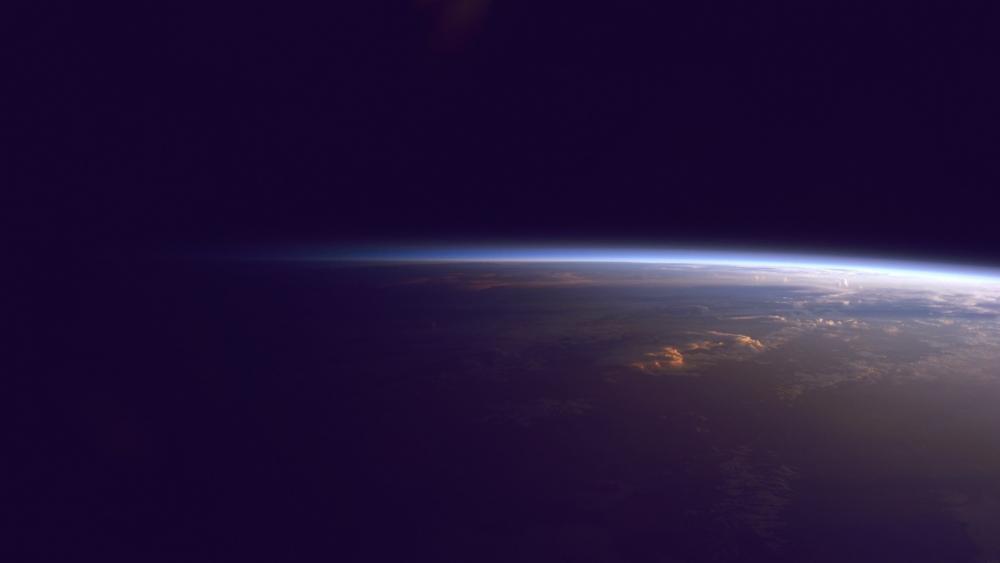 Earth's Subtle Horizon in the Vastness of Space wallpaper