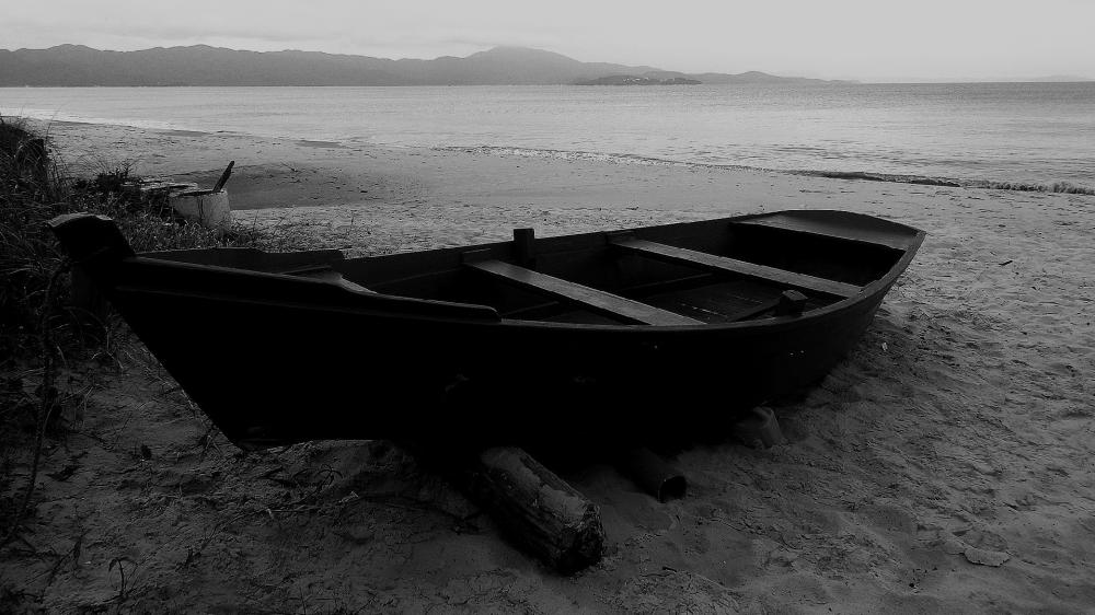 Black & White an old Wooden skiff ocean as well as a beach wallpaper