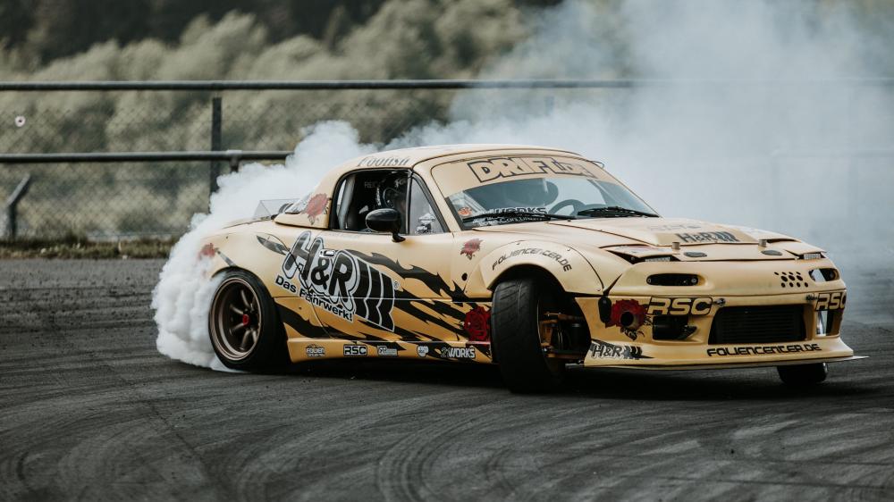 Adrenaline-Fueled Drift Showdown in 4K wallpaper