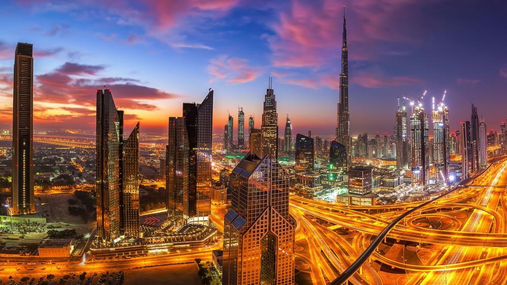 Time lapse photo of the Burj Khalifa and the Sheikh Zayed Road wallpaper