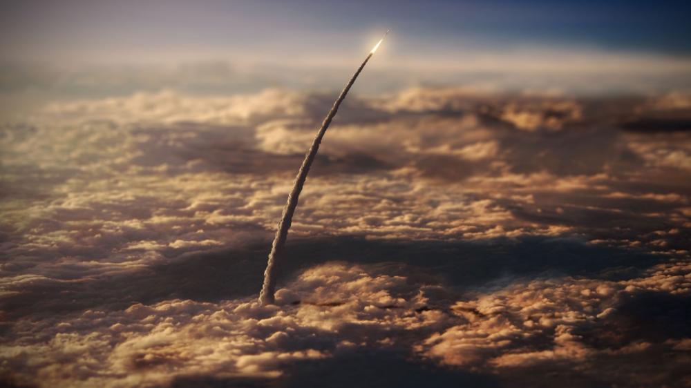 Rocket over clouds wallpaper