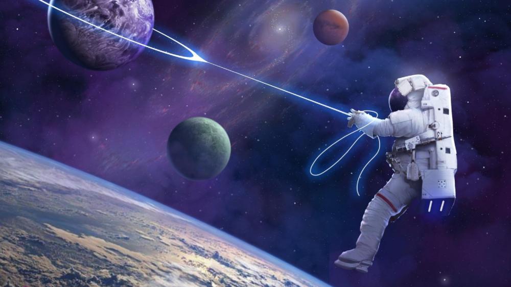 The astronaut holds the planet with a whip wallpaper