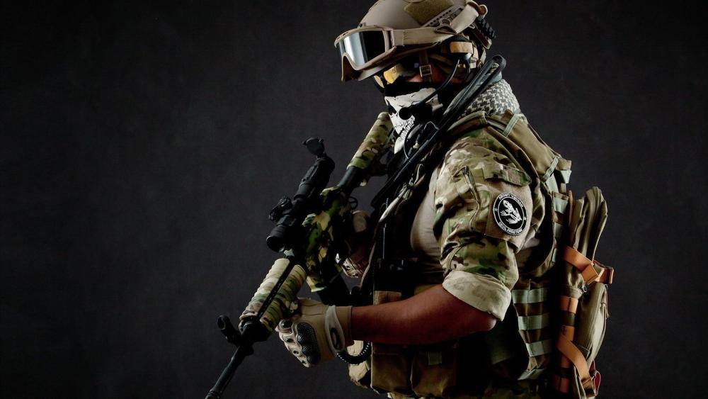 Soldier in Tactical Gear Ready for Mission wallpaper
