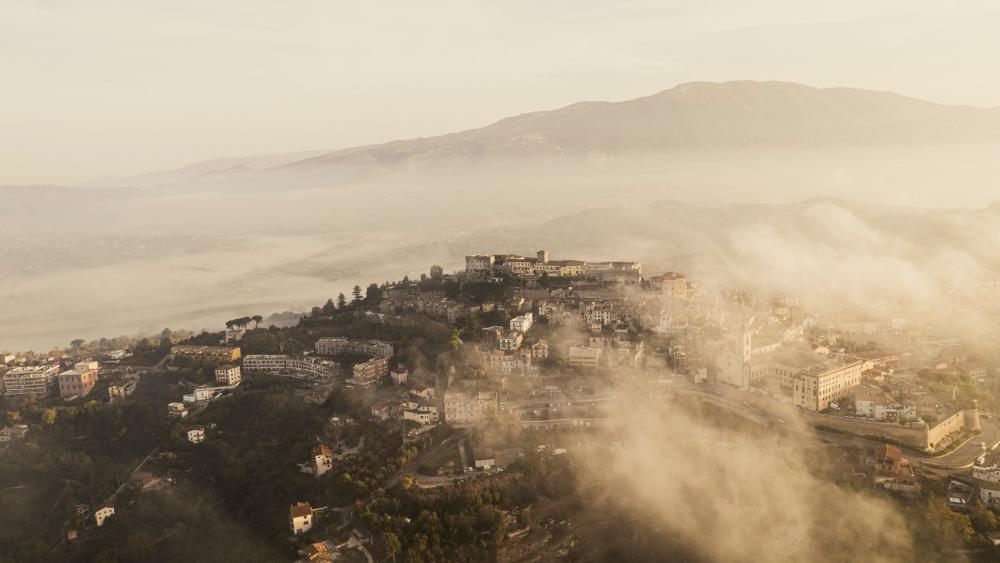 Misty Morning Over a Cityscape wallpaper