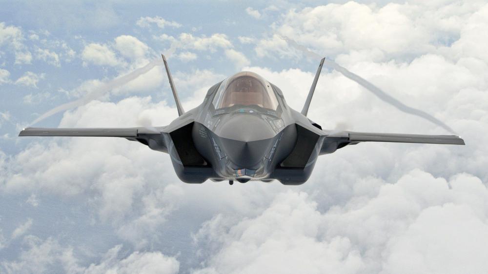Soaring F-35 Among the Clouds wallpaper