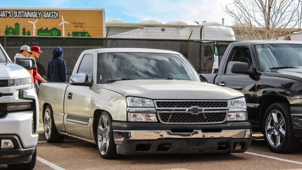 Silver Chevrolet Truck Showing Off Custom Low Ride wallpaper