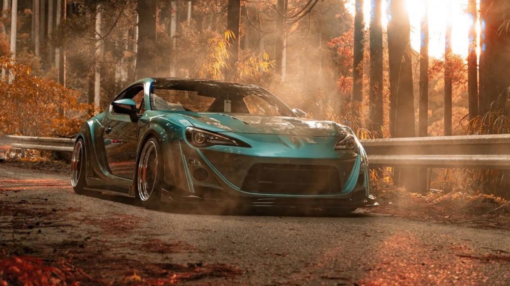 Misty Forest Road with a Toyota Supra wallpaper