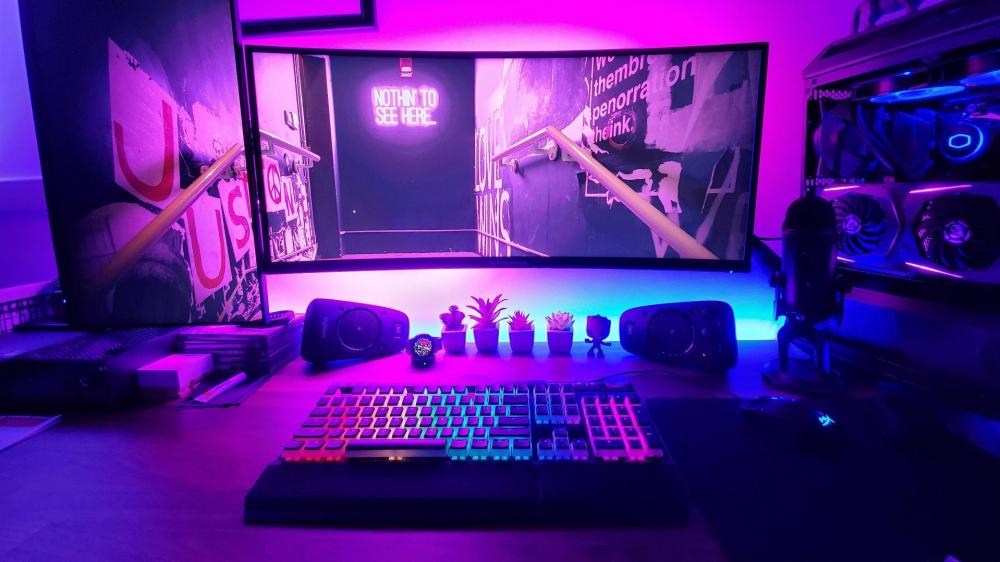Gaming Station in Neon Purple Hue wallpaper