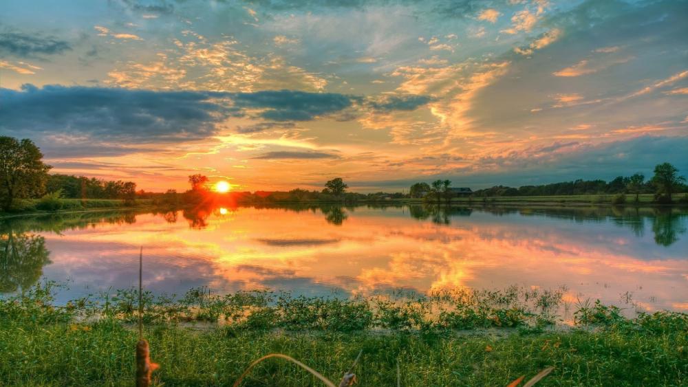 Sunrise Reflections Over a Serene Lake wallpaper