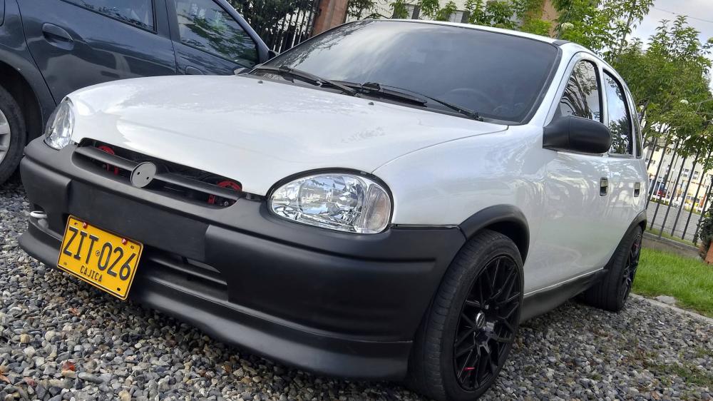 Sleek White Car with Stylish Mods and Bold Stance wallpaper
