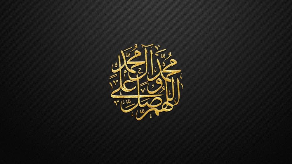 Golden Arabic Calligraphy on Black Background wallpaper