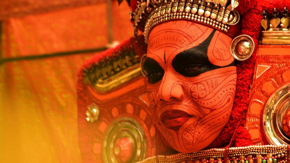 Vibrant Kathakali Dance Face Close-Up wallpaper
